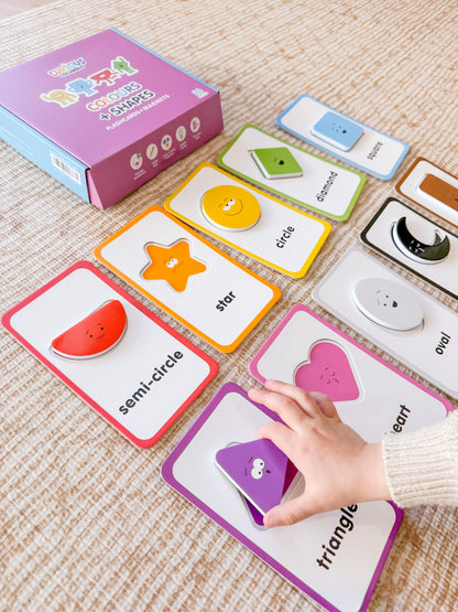 Educational card game with colorful cards on a textured surface